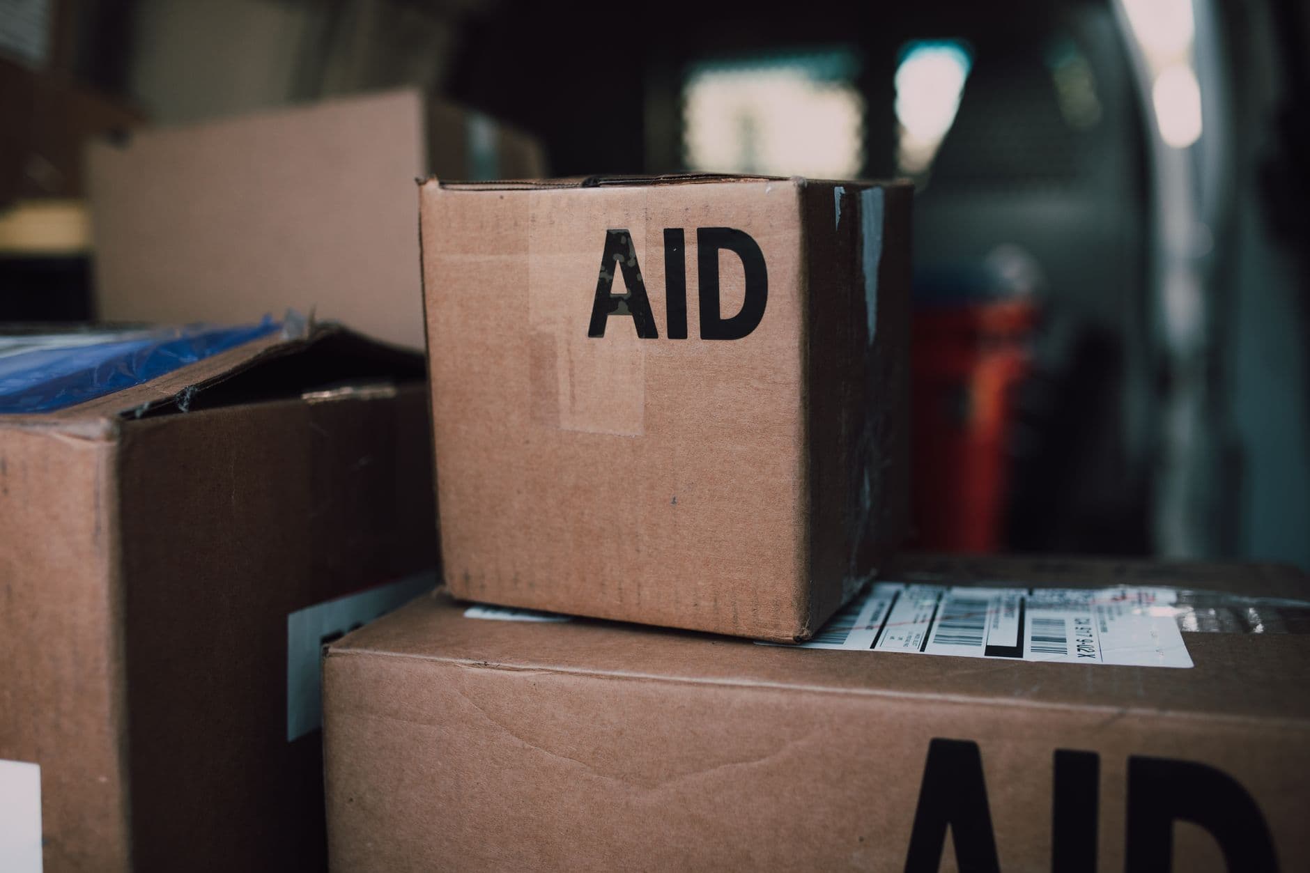 Boxes marked AID loaded in a vehicle, ready to ship to Venezuela